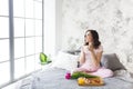 Young pretty woman having breakfast Royalty Free Stock Photo