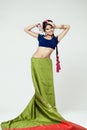 Young pretty woman in indian green dress