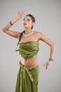 Young pretty woman in indian green dress