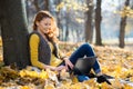 Young pretty woman in the park with laptop Royalty Free Stock Photo