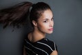 Young pretty woman portrait with ponytail studio shot Royalty Free Stock Photo