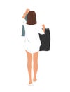 Young pretty woman selecting clothes to wear to the office work. Girl holding up two skirts on a hangers and choosing Royalty Free Stock Photo