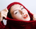 Young pretty woman in sweater and scarf all over her face, lifestyle people winter concept