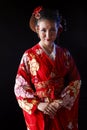 Young pretty woman wearing red kimono Royalty Free Stock Photo