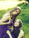 Women in violet dresses Royalty Free Stock Photo