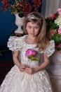 Young princess in a white dress with a tiara on her head Royalty Free Stock Photo