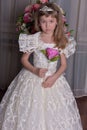 Young princess in a white dress with a tiara on her head Royalty Free Stock Photo