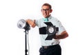 Photographer in his studio setting up lights for the upcoming photoshoot Royalty Free Stock Photo