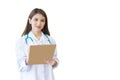 Young professional Asian woman doctor examine report document of patient to plan the next treatment. She look at the camera and Royalty Free Stock Photo