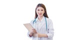 Young professional Asian woman doctor examine report document of patient to plan the next treatment. She look at the camera and Royalty Free Stock Photo