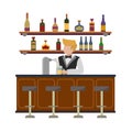 A young professional bartender at the bar pouring beer from tap. Restaurant cafe interior with shelves with wine, tequila, rum.