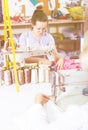 Young professional female tailor using sewing machine Royalty Free Stock Photo