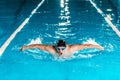 young professional swimmer in competition swimming