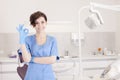 Young professional woman dentist in the dental office Royalty Free Stock Photo