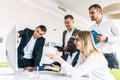 Young professionals team work in modern office. Project manager team discussing new idea. Business crew working with startup. Royalty Free Stock Photo