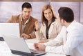 Young professionals teamworking in meeting room Royalty Free Stock Photo