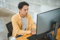 Young programmer working on coding, software development and web design in software company office.Concept technology development Royalty Free Stock Photo
