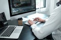 Young Programmer working in software javascript computer in IT office, Writing codes and data code website and coding database Royalty Free Stock Photo