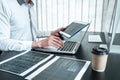 Young Programmer working in software javascript computer in IT office, Writing codes and data code website and coding database Royalty Free Stock Photo