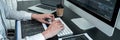 Young Programmer working in software javascript computer in IT office, Writing codes and data code website and coding database Royalty Free Stock Photo