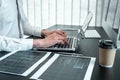 Young Programmer working in software javascript computer in IT office, Writing codes and data code website and coding database Royalty Free Stock Photo