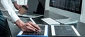 Young Programmer working in software javascript computer in IT office, Writing codes and data code website and coding database Royalty Free Stock Photo