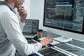 Young Programmer working in software javascript computer in IT office, Writing codes and data code website and coding database Royalty Free Stock Photo