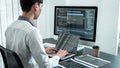 Young Programmer working in software javascript computer in IT office, Writing codes and data code website and coding database Royalty Free Stock Photo