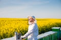 Young proud apiarist Royalty Free Stock Photo