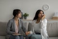 Young psychologist supporting crying middle eastern woman during psychotherapy session. Professional help concept Royalty Free Stock Photo