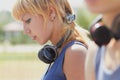 Young punk girl with wireless headphones Royalty Free Stock Photo
