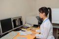 Young radiologist doctor edit and analyses the digital x ray