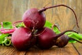 Young Raw Organic Red Beets on wooden table Royalty Free Stock Photo