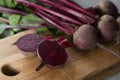 Young raw red beets roots with leaves Royalty Free Stock Photo