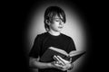 Young reader black and white photo Royalty Free Stock Photo