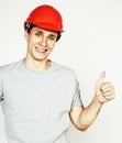 Young real hard worker man isolated on white background on ladder smiling posing, business people concept Royalty Free Stock Photo