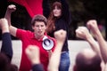 Young rebellious man with megaphone