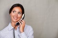 Young receptionist talking on the phone Royalty Free Stock Photo
