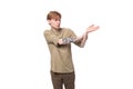 young red-haired man in a beige shirt on a white background Royalty Free Stock Photo