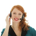 Young red haired woman with head set Royalty Free Stock Photo