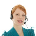 Young red haired woman with head set Royalty Free Stock Photo