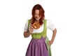 Young red head woman in traditional bavarian costume Royalty Free Stock Photo