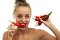 Young with red hot chilli pepper Royalty Free Stock Photo