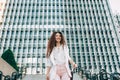 Young redhead business woman walking on the stairs Royalty Free Stock Photo