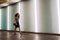 Young redhead business woman walking to work Royalty Free Stock Photo