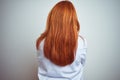 Young redhead doctor woman using stethoscope over white isolated background standing backwards looking away with crossed arms Royalty Free Stock Photo