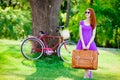 Girl in sunglasses holding suitcase Royalty Free Stock Photo