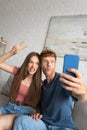 young redhead man grimacing and taking Royalty Free Stock Photo