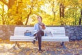 Young redhead woman in blue dress with pet Royalty Free Stock Photo