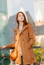 Woman in coat have a rest on Frankfurt streets Royalty Free Stock Photo